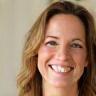 Sarah Clarke smiling, repeat client testimonial headshot